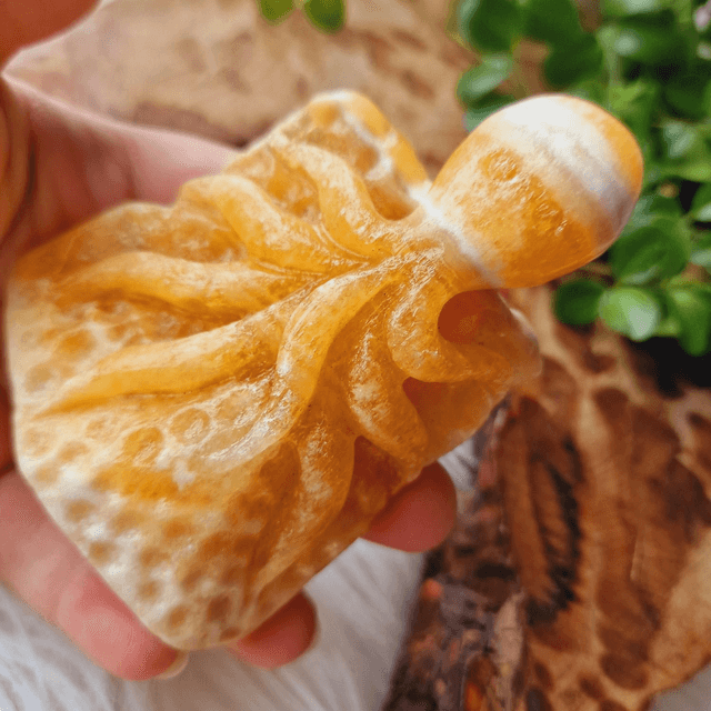 Orange Calcite Hangcarved Octopi 184g