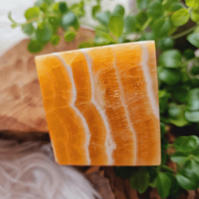 Orange calcite cube 411g