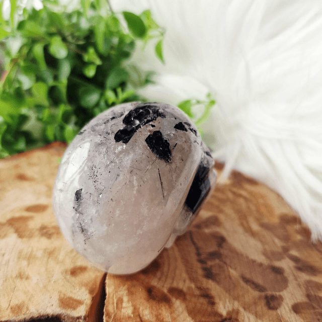 Tourmaline in quartz skull 358g