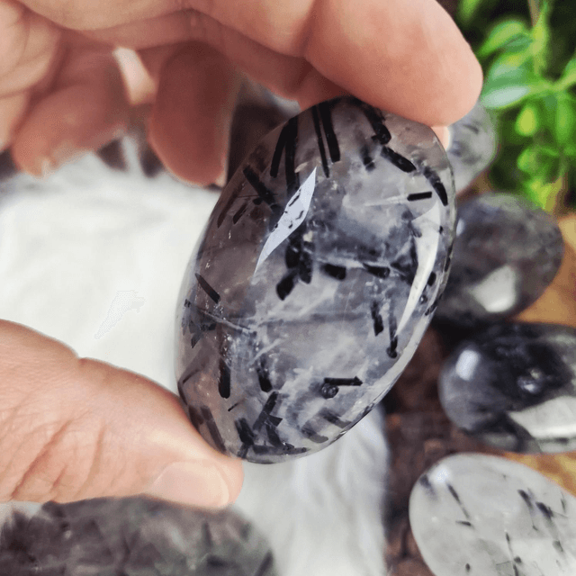Tourmaline in quartz palm