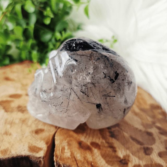 Tourmaline in quartz skull 358g