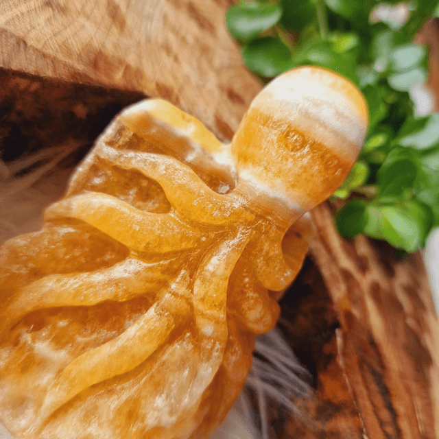 Orange Calcite Hangcarved Octopi 184g