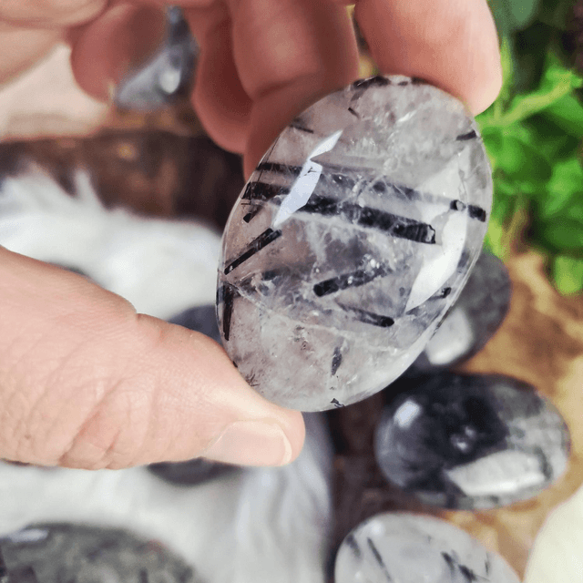 Tourmaline in quartz palm