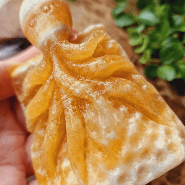 Orange Calcite Hangcarved Octopi 184g