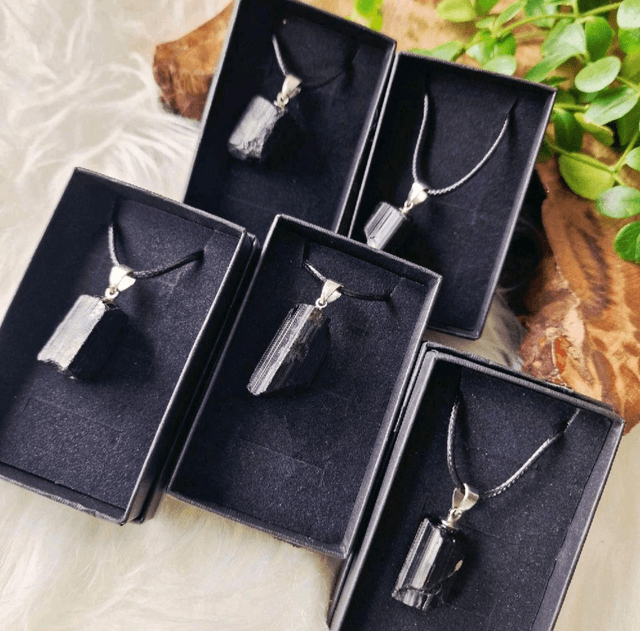 Raw black tourmaline pendant in box
